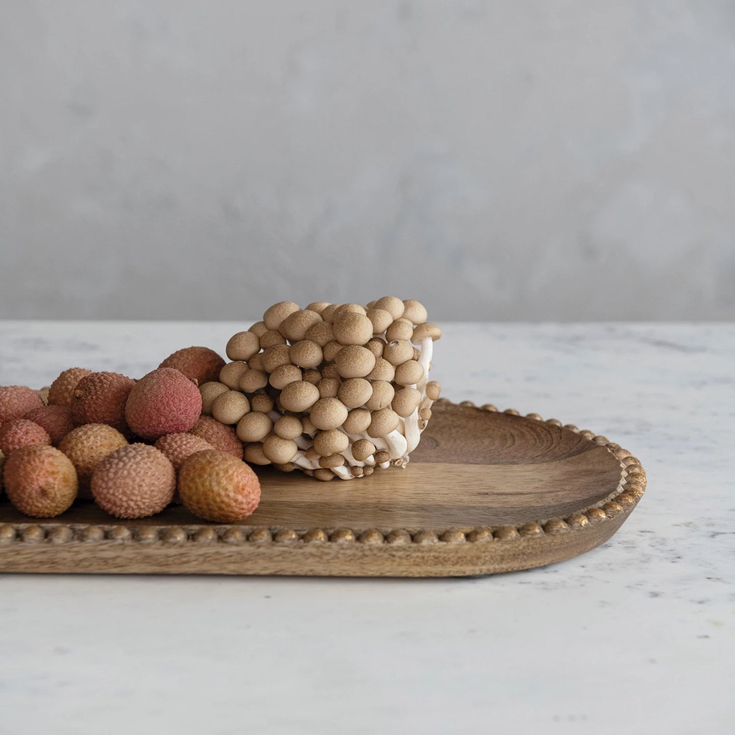 HAND CARVED MANGO WOOD TRAY WITH WOOD BEADS AND GOLD FINISH